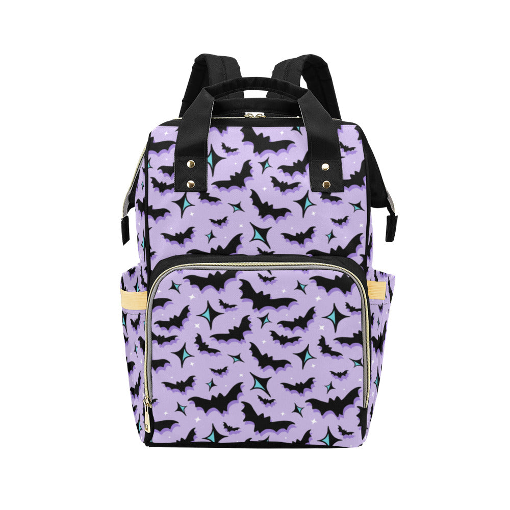 Purple backpack with black bat pattern on a white background